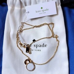 Shiny gold plated metal with enamel coating